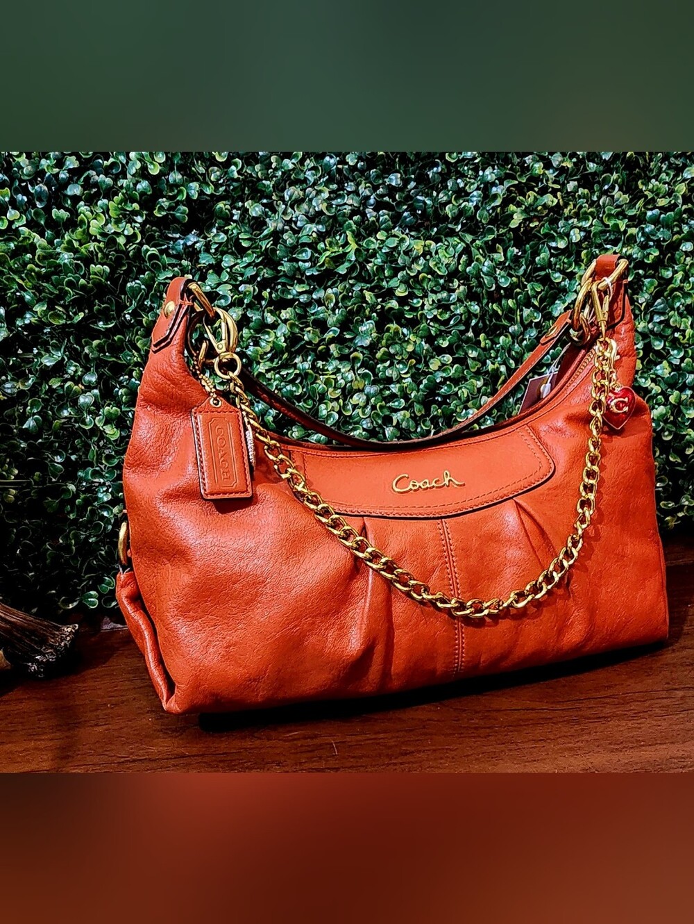 Coach Orange Leather Shoulder Bag with Gold Chain Accent